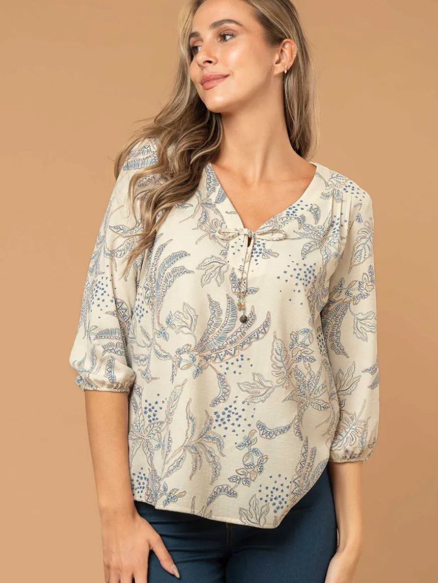 Blouse imprimé feuillage col bijou
